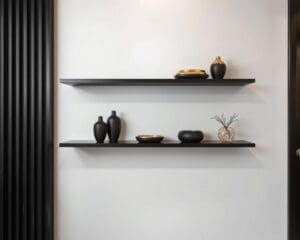 Design wandplank in goud en zwart: chique en modern